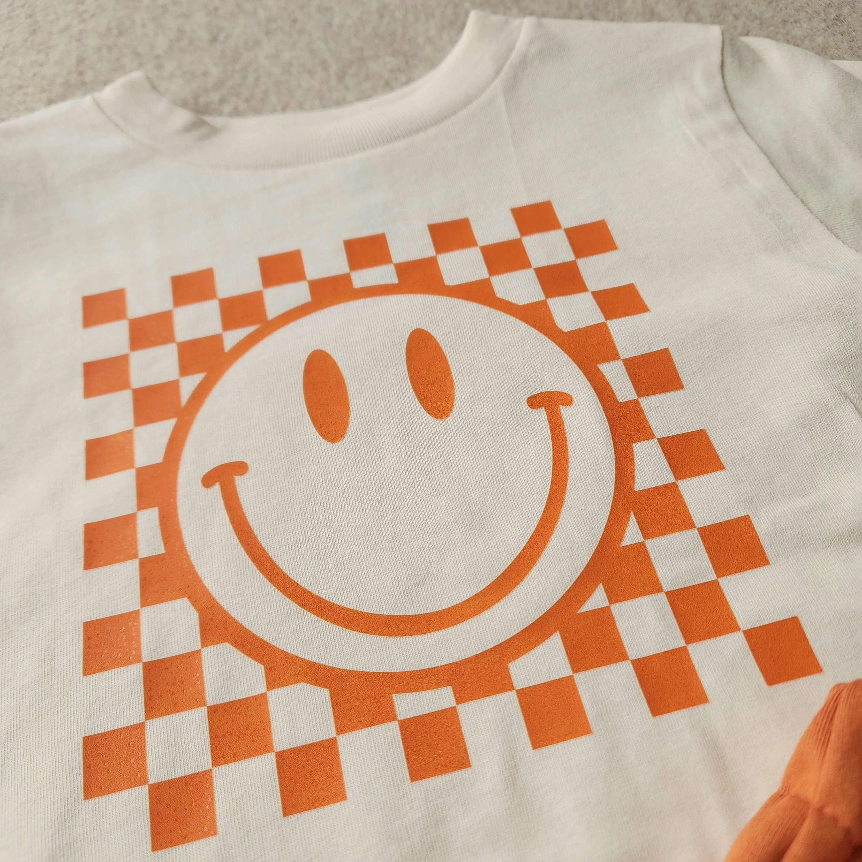 Checkered Smiley Face Tee